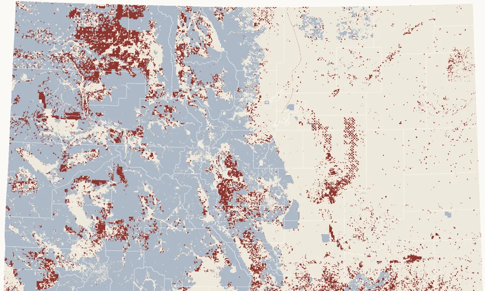Map of Colorado showing private surface over federal minerals in red
